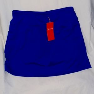 BlevonH women's Skort, blue in color, size M